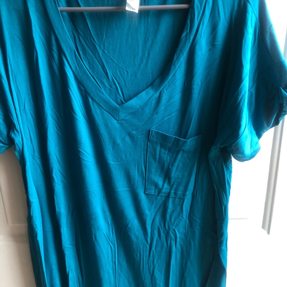 Turquoise colored V neck tee